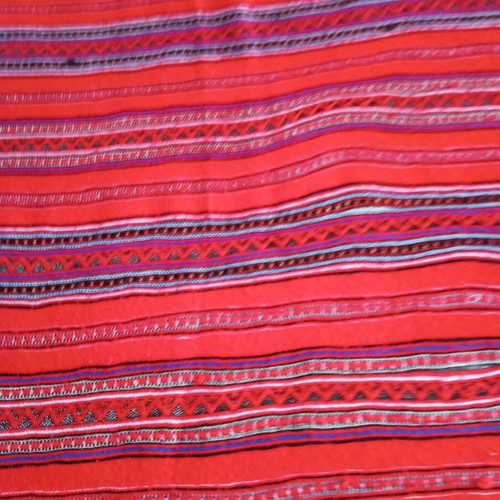 Woven blanket cover used, striped wool