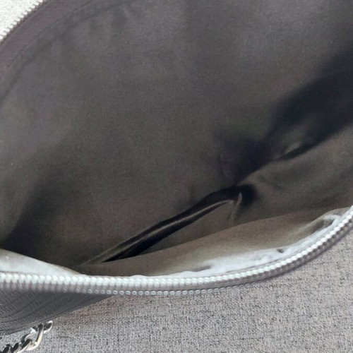 Handmade black wrist bag new from embossed leatherette