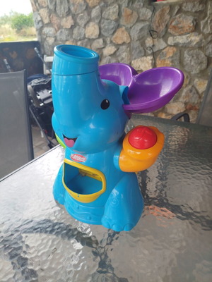 Elephant ball launcher toy used, missing bottom cover