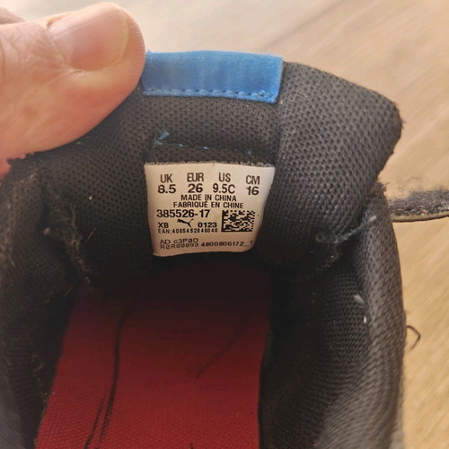 Puma kid shoes size 26 used, black and yellow