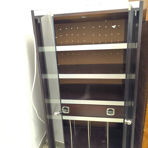 Vintage wooden cabinet with silver details, shelves and glass doors