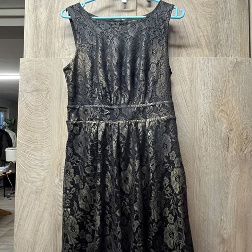Women's dress with open back, new