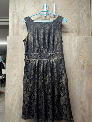 Women's dress with open back, new