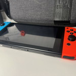 Nintendo Switch като нов с предпазен калъф за носене