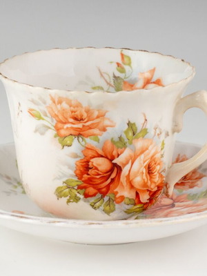 Antique porcelain souvenir cup and saucer used
