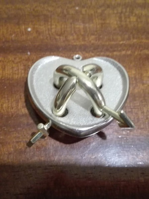 Metal Hanayama puzzle Amour used, heart with rings