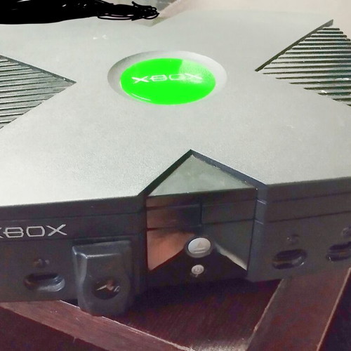 Original Microsoft Xbox console with controller and cables