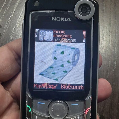 Nokia 6680 like new with original headphones without battery