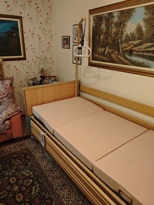 Electric hospital bed very adjustable like new with traction and brakes