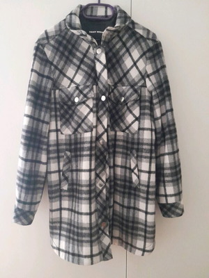 Light jacket used, black and gray, size L with hole in left pocket