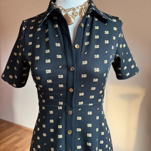 Sugarbird dress with buttons black with gold logo like new