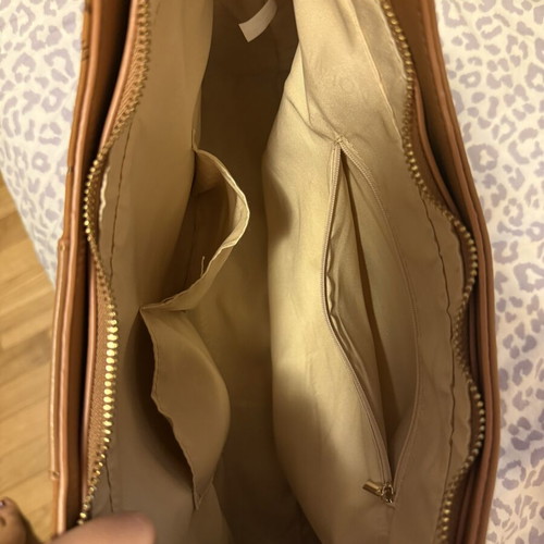Nolah shoulder bag in camel and brown with monogram design