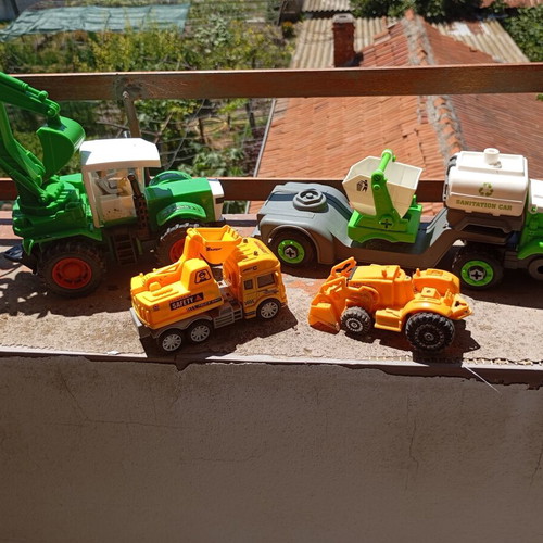 Children's construction and specialized toy trucks set of 4 used