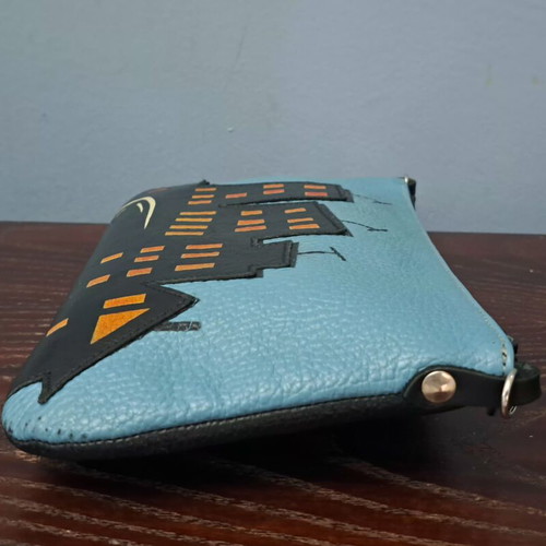Handmade leather crossbody bag with urban design