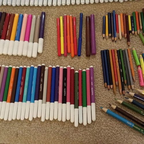 Painting set used with colored pencils and markers