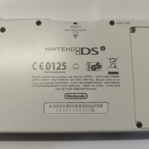 Nintendo DSi white console with 10 games and stylus used