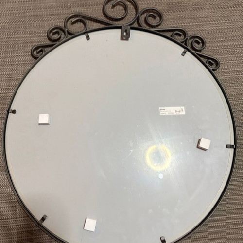 Round decorative wall mirror with metal frame, vintage style