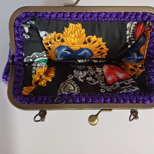 Knitted clutch bag like new, purple with gold details