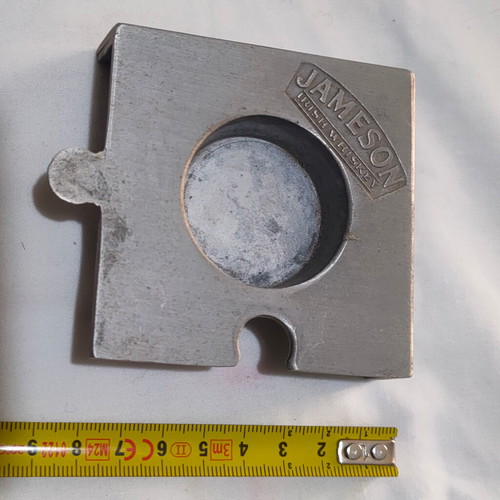 Jameson tealight used, puzzle-shaped commemorative holder