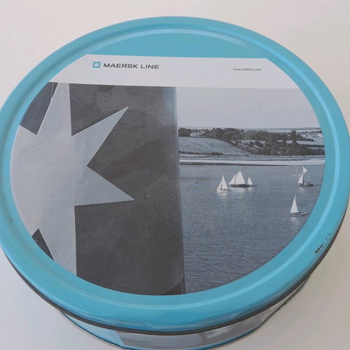Maersk metal biscuit tin used with some dents