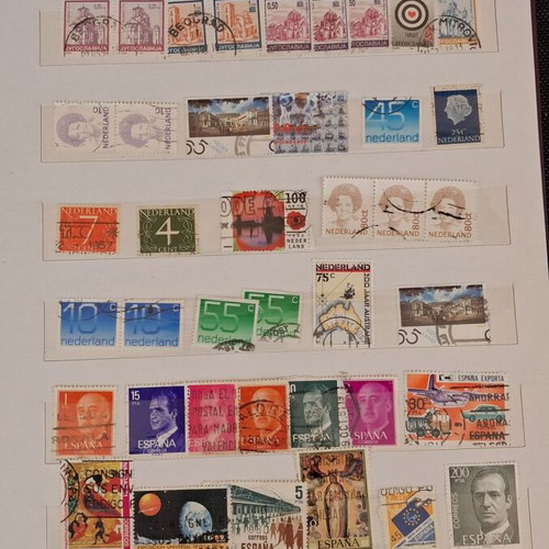Stamp album used with 10 pages of foreign stamps 1960-1990