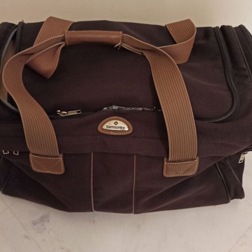 Samsonite large travel bag used, needs repair, brown