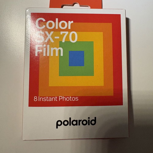 Polaroid Sonar AF 5000 instant camera with 8-frame film pack