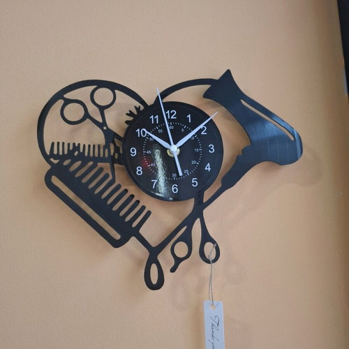 Wall clock made of vinyl new, silent operation 25x30 cm
