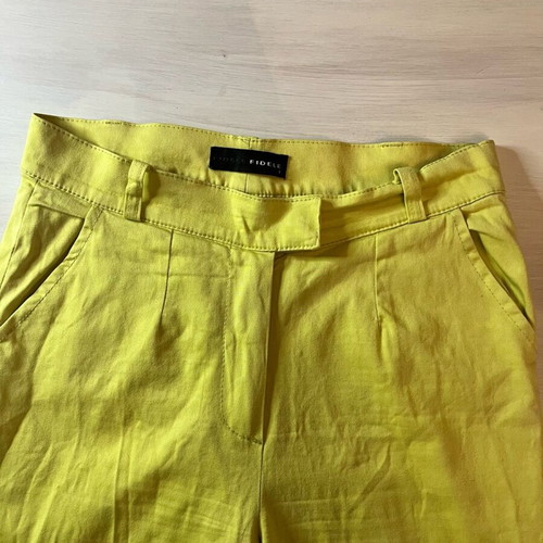 Yellow elastic pants used, size Small-Medium
