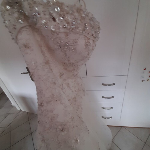 Wedding dress ivory used, strapless with thin extra straps, size small