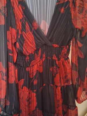 Dress like new, size S/M, black with red flowers, transparent back and sleeves