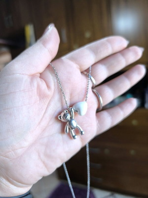 Handmade steel necklace with pendant teddy bear and white ceramic heart