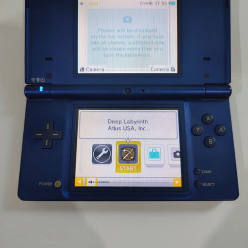 Nintendo DSi handheld console with Pokemon HeartGold game