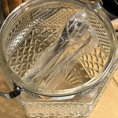 Glass ice bucket used with silver rack and engraved design