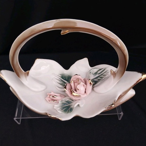 Vintage porcelain decorative basket with roses