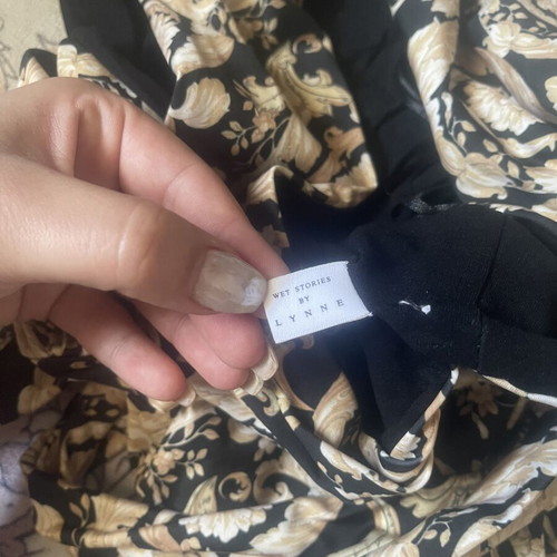Lynne one-piece swimsuit like new, black and gold, size M