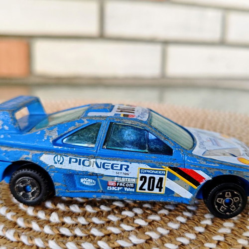 Peugeot 405 T16 Grand Raid diecast model used, vintage 1:43 scale