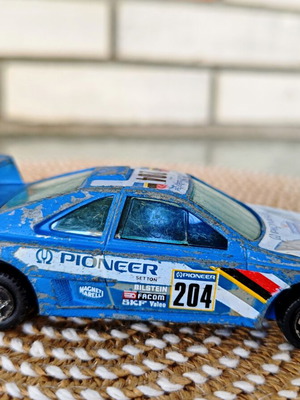 Peugeot 405 T16 Grand Raid diecast model used, vintage 1:43 scale
