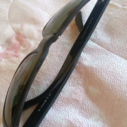Ridley men's sunglasses with green lenses, broken frame
