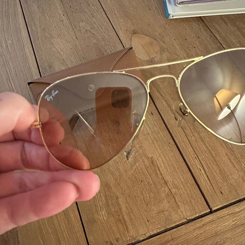 Ray Ban sunglasses used with gold frame and pink lens