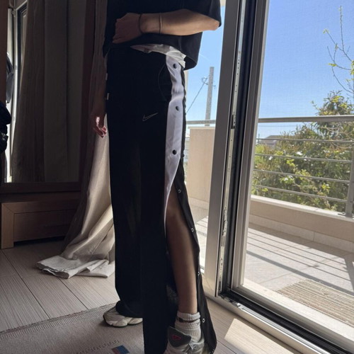 Nike tracksuit with side buttons like new, black and white