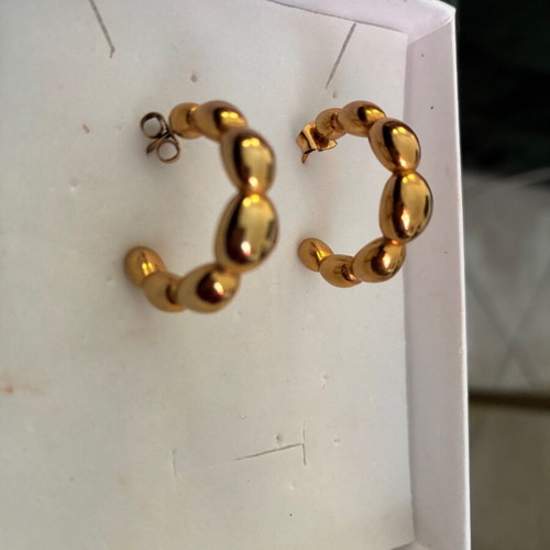 Steel gold hoop earrings new with impressive design