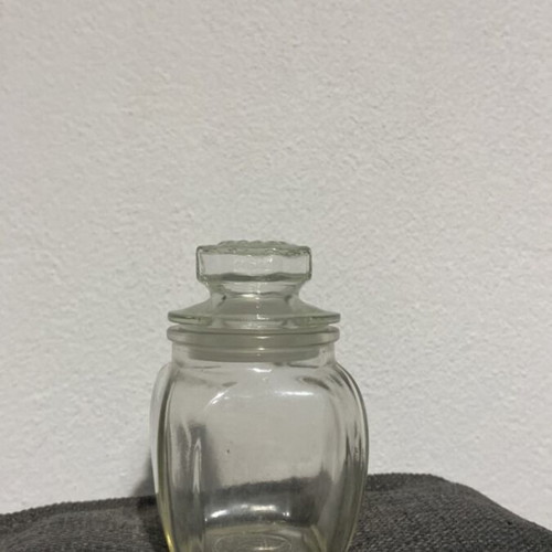 Vintage glass jar with embossed lid like new