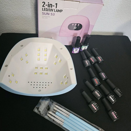UV LED nail lamp with display like new with gel polishes and tools