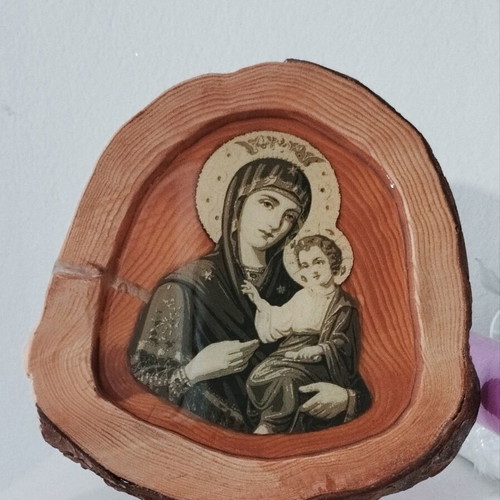 Handmade religious icon on natural wood with epoxy resin