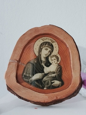 Handmade religious icon on natural wood with epoxy resin