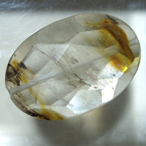 Mineral quartz with oxide inclusions like new