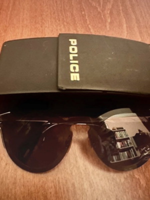 Γυαλιά ηλίου Police σαν καινούργια, μαύρα με μεταλλικό σκελετό