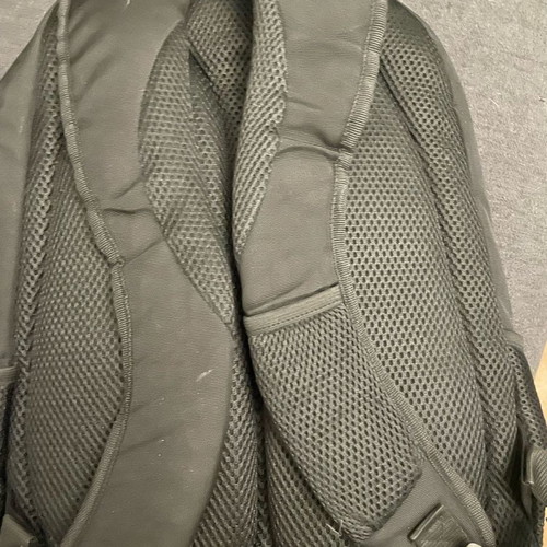 School bag used LYC SAC black and white with large compartments and two zippers