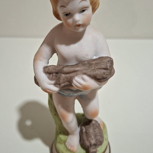 Porcelain figurine of a child vintage, like new